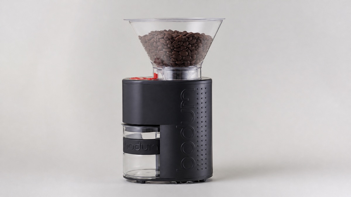 Black Bodum Bistro electric burr grinder with a clear bean hopper and glass grounds catcher